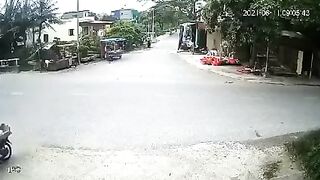 Small Truck Sweeps Up A Cyclist