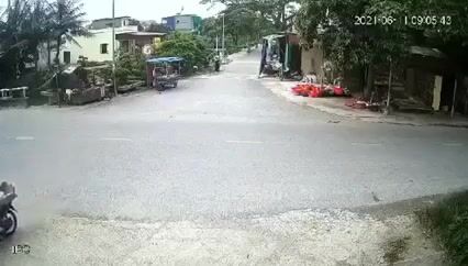Small Truck Sweeps Up A Cyclist