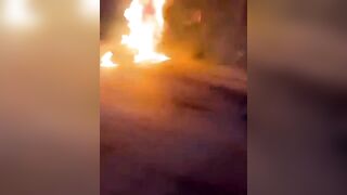 Motorcyclist carrying gasoline  dies in fiery crash