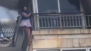 Woman Trying To Escape House Fire Falls To Her Death