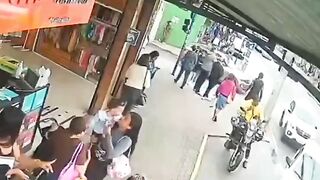 Police Officer Gets Gunned Down On The Busy Street In Brazil