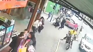 Police Officer Gets Gunned Down On The Busy Street In Brazil