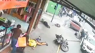 Police Officer Gets Gunned Down On The Busy Street In Brazil