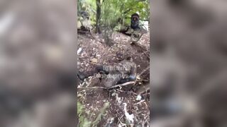 Colombian merc films his dead friend.