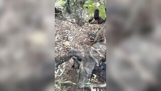 Colombian merc films his dead friend.