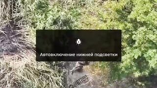A HEADLESS UKRAINIAN SOLDIER STILL MOVING