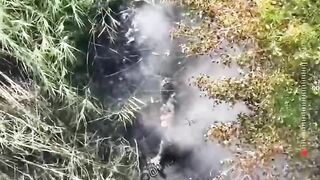 A HEADLESS UKRAINIAN SOLDIER STILL MOVING