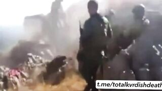 Turkish soldiers are giving candy to PKK soldiers.