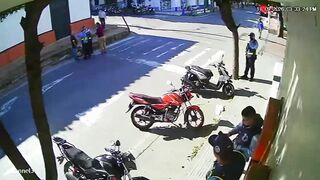 Colombian Traffic Cop Dropped In Coward Punch Attack