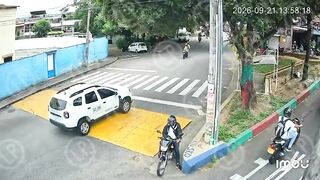 Motorcyclist Stops To Check His Phone, Second Later The Hitman Appears