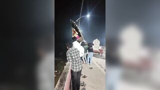 LOL Man Falls from Flyover During Ganesh Idol Immersion