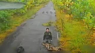 Just another burning katsap with guts out on Ukrainian road