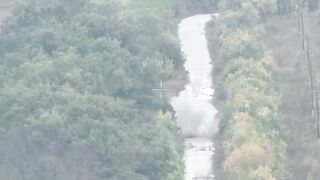 Just another burning katsap with guts out on Ukrainian road