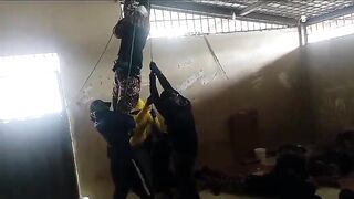 CLASSIC Guards were hanged to death during a prison riot in Ecuador