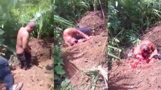 CLASSIC A handcuffed man's head was blown apart by automatic rifle fire
