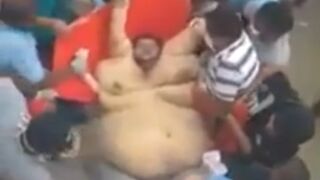 Classic: Crowd Struggles to Move Extremely Obese Man  Who Died in the Street