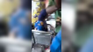 WTF: Nigerian Police Officer Grabs A  Penis Of A Suspected Thief