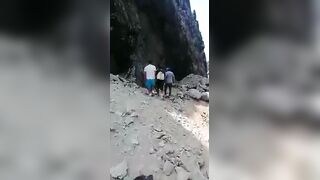 Classic: Man Falls From Cliff In The Background