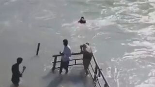 Away in the Swift Current of the River While Swimming With Friends In India