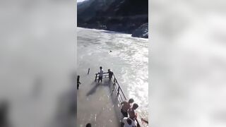 Away in the Swift Current of the River While Swimming With Friends In India