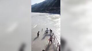Away in the Swift Current of the River While Swimming With Friends In India