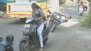 Motorcyclist Gets Knocked Out By Speeding Bus