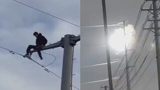 Wasted Man Climbs On The Pole And Contacts Live Wire
