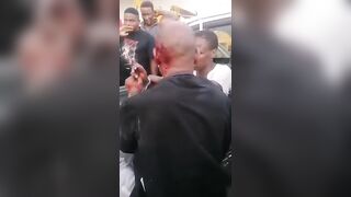 Cuffed Motorcycle Thieves Assaulted By Mob In Botswana