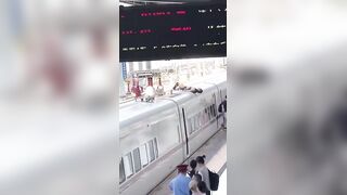 Man Electrocuted on Top of Train at Railway Station in China