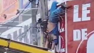 Worker Suffers Electric Shock During Advertising Installation