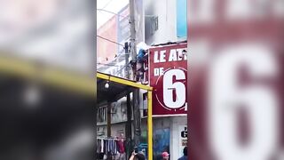 Worker Suffers Electric Shock During Advertising Installation