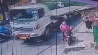 Female Motorcyclist Killed After Being Run Over by Truck
