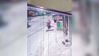 Female Motorcyclist Killed After Being Run Over by Truck