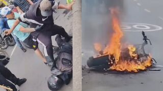 Criminal Who Robbed A Woman Attacked By Mob, His Motorcycle Set Ablaze