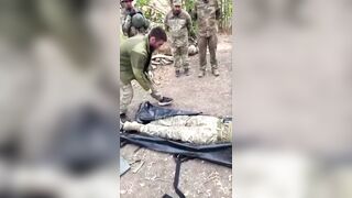 Ukrops use their dead friend in training.