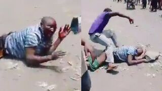 Thief Gets Killed With A Huge Rock On The Busy Road In Congo