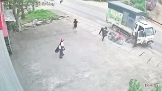Couple On Mopd Run Over By Truck, One Dead