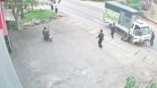 Couple On Mopd Run Over By Truck, One Dead