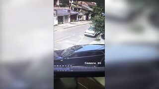 Rider Gets Crushed Against The Wall By Reversing SUV In China