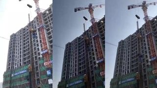 CLASSIC Idiot falls after hanging off crane