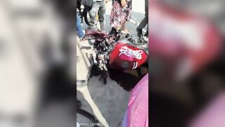 Moment Couple Riding Motorcycle Crashes Into Renault Clio In Colombia