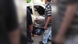 Moment Couple Riding Motorcycle Crashes Into Renault Clio In Colombia