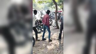 Man Brutally Attacked With a Sickle on Busy Street as Bystanders Watch in Shock