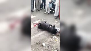 Man Brutally Attacked With a Sickle on Busy Street as Bystanders Watch in Shock
