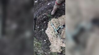 DEAD UKRAINIANS GET THEIR INSIGNIA OFF