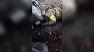 DEAD UKRAINIANS GET THEIR INSIGNIA OFF