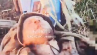 EERIE SCENE OF EXHAUSTED SOLDIER KILLED BY A RUSSIAN DRONE