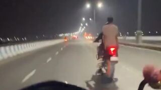 Scooter Stunt Ends in Crash In India