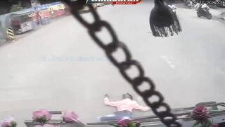 Two Men On Pink And White Moped Hit By Bus, One Dies