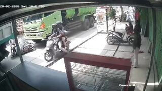 Motorcyclist Seriously Injured After Getting Sandwitched By Two Trucks